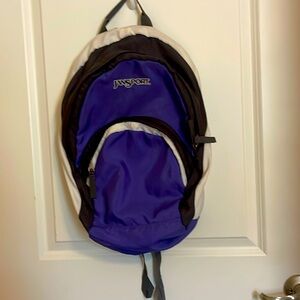 handout purple white and charcoal backpack